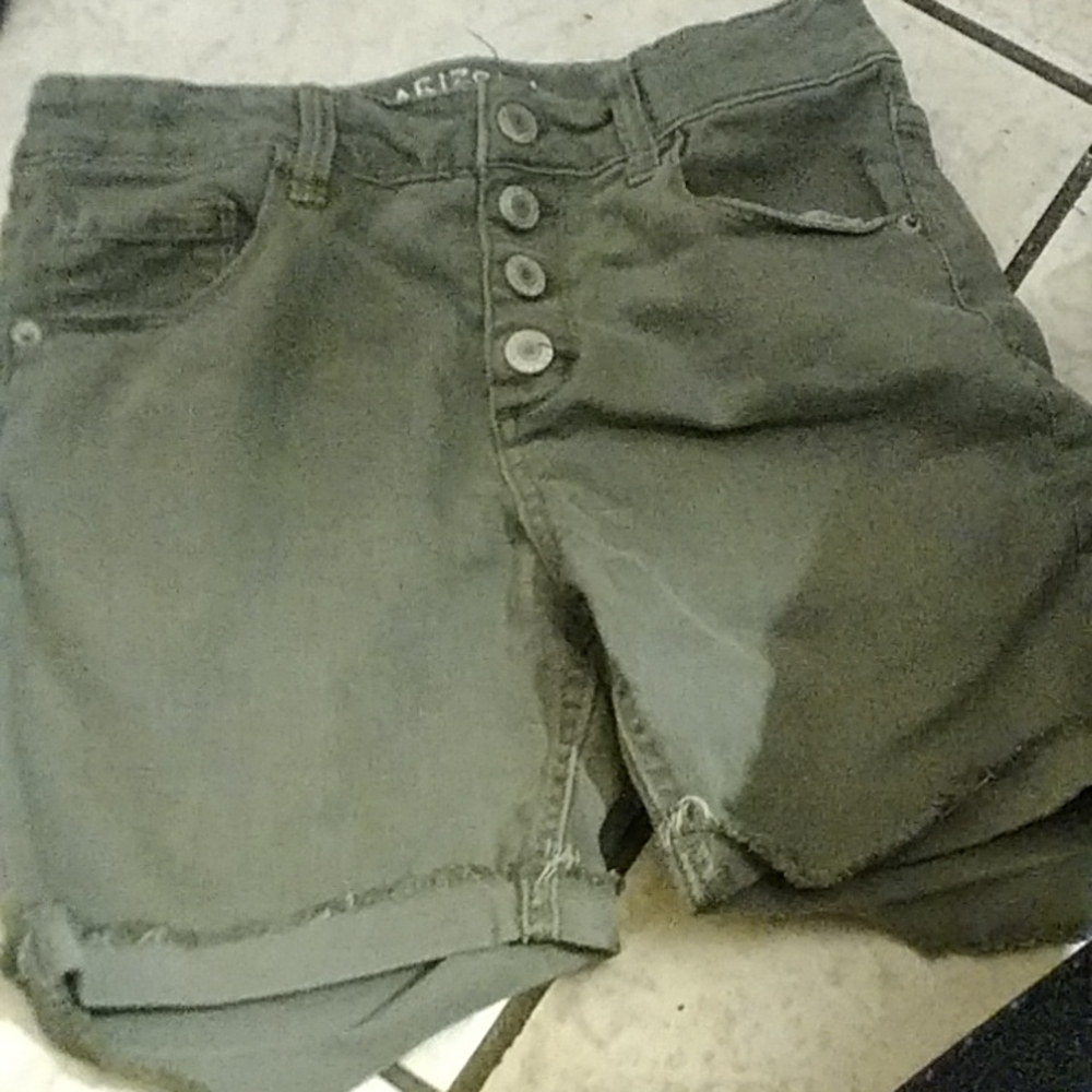 The jean shorts that are green